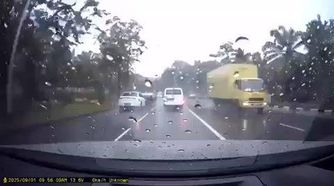 Car overtakes & crashes into lorry in opposite lane at Upper Changi Road North